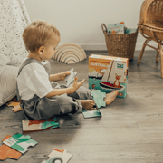 Boy playing with Mizzie The Kangaroo Puzzle Set for Toddlers
